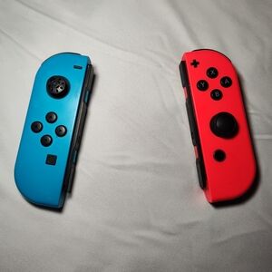 Nintendo Joy-Con Controllers - Neon Red and Blue